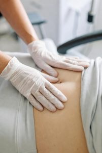 Lisa Day performing Mummy MOT assessment at Bodyfix Clinic